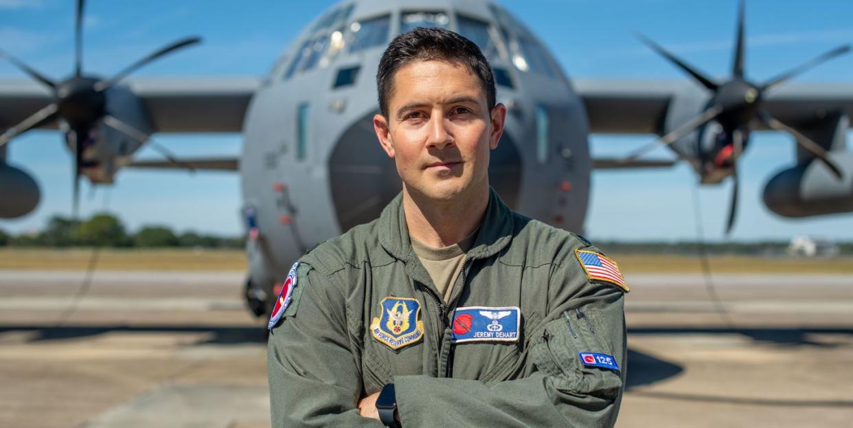 lt col jeremy dehart, 53rd weather reconnaissance squadron aerial reconnaissance weather officer, stands in front of a wc 130j super hercules aircraft at keesler air force base, oct 18, 2022 the 53rd wrs supports weather data collection efforts around the year us air force photo by staff sgt kristen pittman