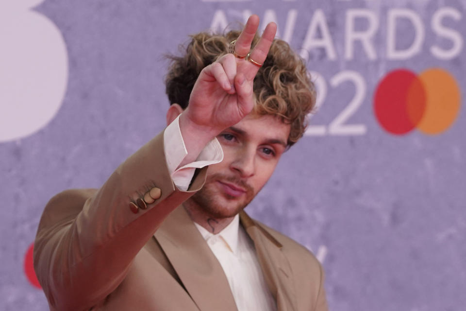 Tom Grennan poses on the red carpet