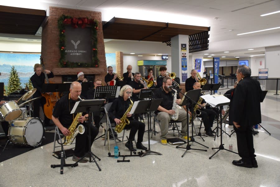 A music group performing at the Colorado Springs Airport