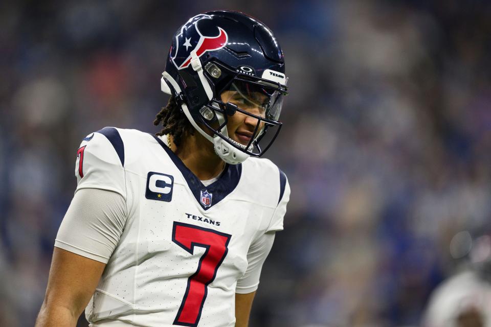 Houston Texans quarterback C.J. Stroud (7) celebrates a touchdown pass during an NFL football game against the Indianapolis Colts, Saturday, Jan. 6, 2024, in Indianapolis. (AP Photo/Zach Bolinger)