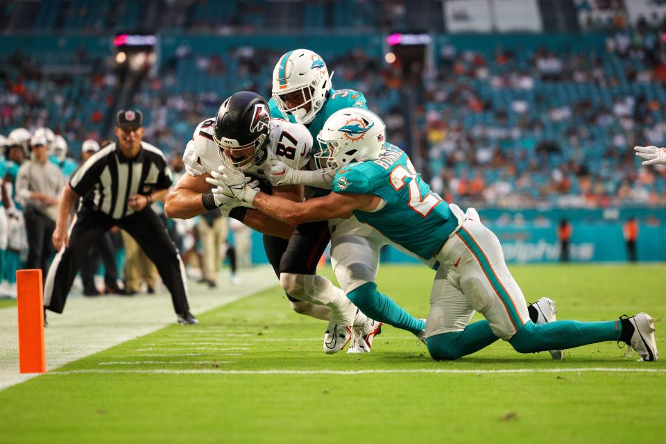 Atlanta Falcons tight end John FitzPatrick (87) is tackled short of the end zone by Miami Dolphins cornerback Ethan Bonner (27) in the first quarter during preseason at Hard Rock Stadium. Nathan Ray Seebeck-USA TODAY Sports