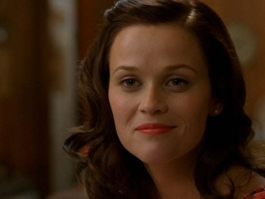 Reese Witherspoon as June Carter Cash smirking