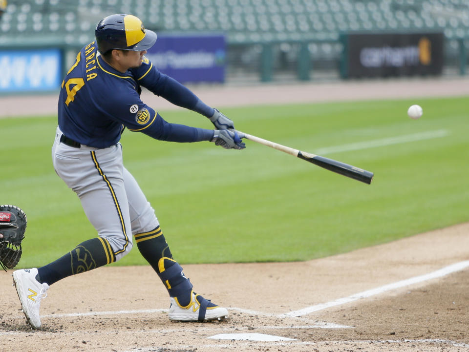 Milwaukee Brewers' Avisail Garcia (24) hits a double to drive in two runs against the Detroit Tigers during the second inning of a baseball game Wednesday, Sept. 9, 2020, in Detroit. (AP Photo/Duane Burleson)