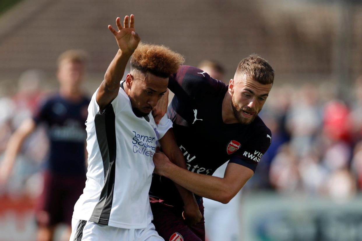 Learning the ropes: Calum Chambers against Boreham Wood: REUTERS