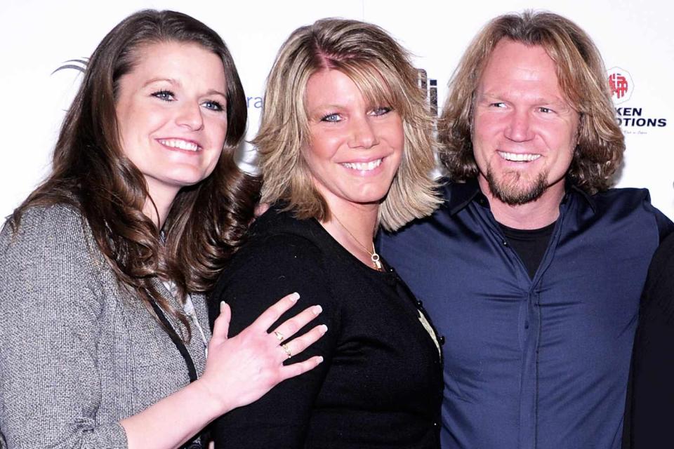 <p>Ethan Miller/Getty</p> (L-R) Robyn Brown, Meri Brown, Kody Brown are pictured t the grand opening of Mike Tyson