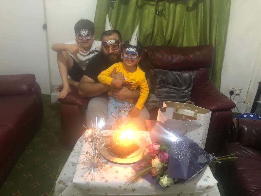 Asim Riaz and his two sons celebrate a birthday just weeks before their tragic trip to Loch Lomond (Iqra Riaz)