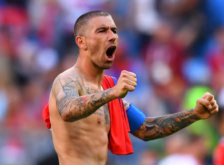 Soccer Football - World Cup - Group E - Costa Rica vs Serbia - Samara Arena, Samara, Russia - June 17, 2018 Serbia's Aleksandar Kolarov celebrates victory after the match REUTERS/Dylan Martinez