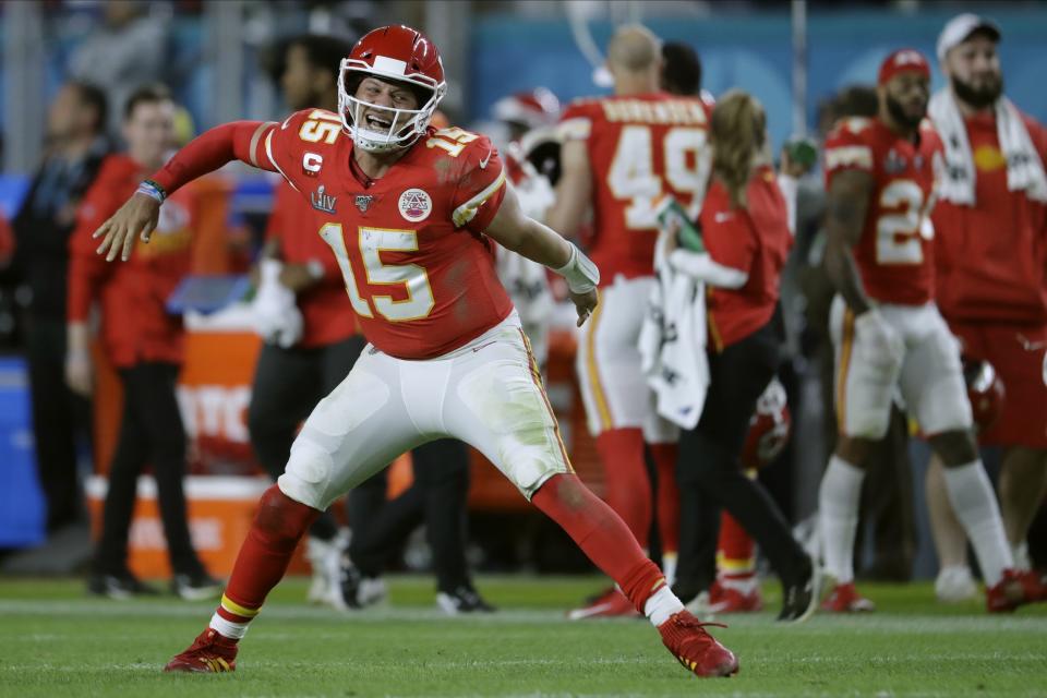 FILE - In this Feb. 2, 2020, file photo, Kansas City Chiefs' quarterback Patrick Mahomes celebrates his touchdown pass to Damien Williams in the the second half of the NFL Super Bowl 54 football game in Miami Gardens, Fla. (AP Photo/John Bazemore, File)