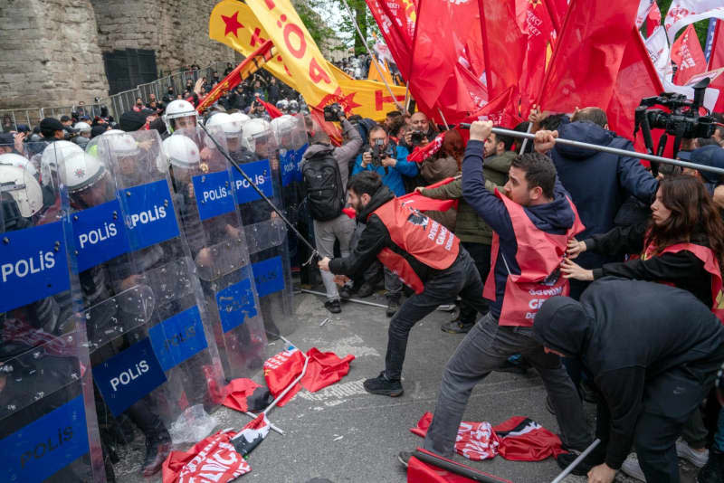 Turkish riot police clash with protesters as they try to reach Taksim Square for an unauthorized May Day rally in Istanbul. Tolga Uluturk/ZUMA Press Wire/dpa