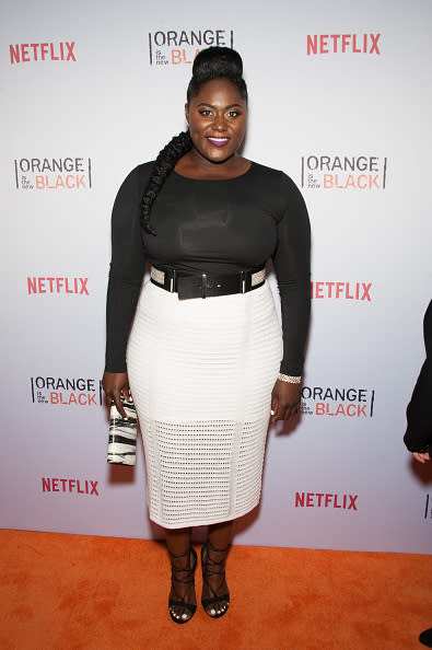 Brooks carried the black and white theme through her entire look—from her clutch, to her shoes to her nail polish—with just a single pop of color: purple lipstick!