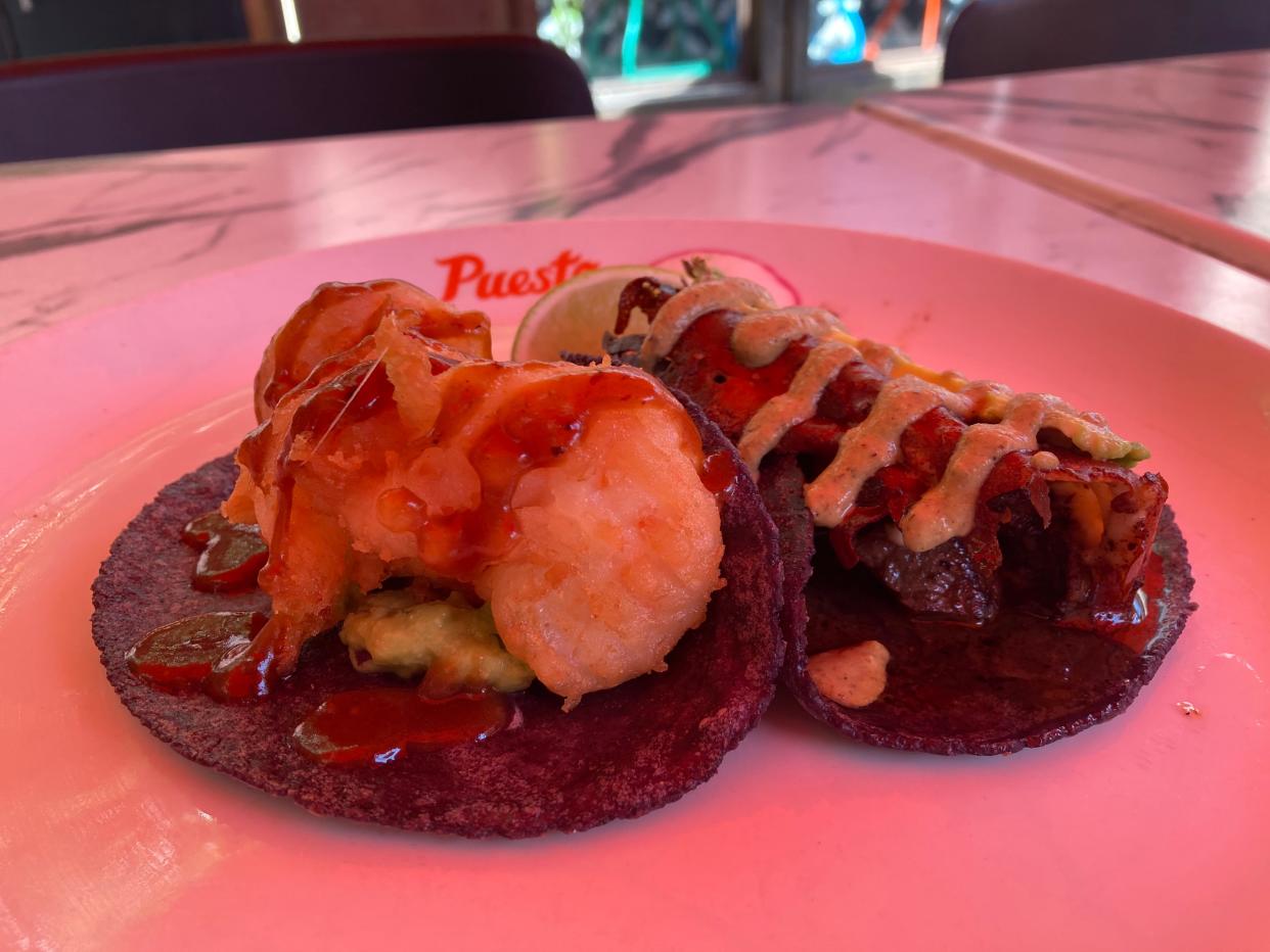 A tamarindo shrimp taco and filet mignon taco from Puesto at the Headquarters in San Diego on April 6, 2022.