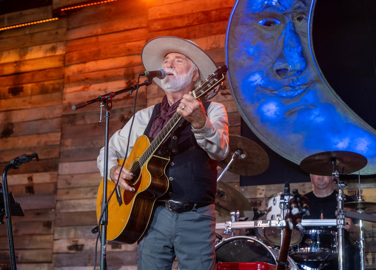 Award-winning singer and songwriter Michael Martin Murphey plays for the crowd at the 2023 Pickin' for Perryton fundraiser event at the Starlight Ranch in Amarillo, Texas.