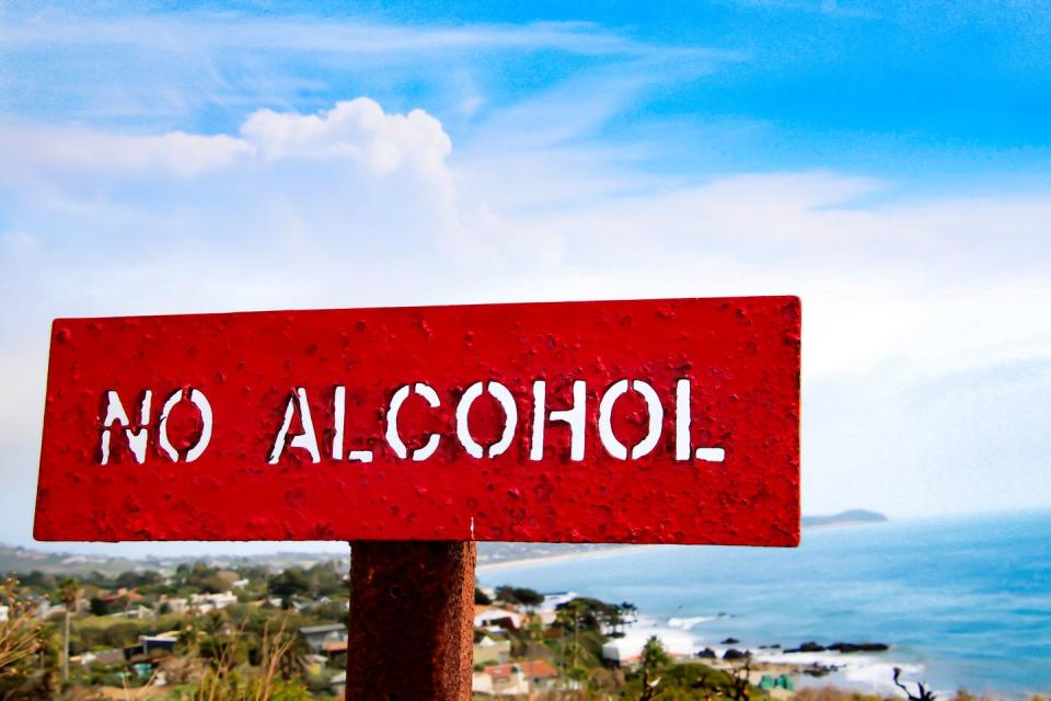 a “no alcohol” sign posted at a state beach park