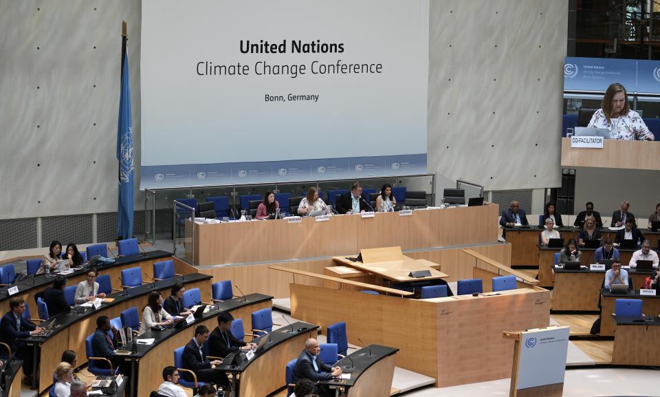 Participants meet at the United Nations Climate Change Conference in Bonn, Germany, Thursday, June 8, 2023. Al-Jaber said he wants the COP28 summit in Dubai to be "inclusive" and deliver a “game-changing outcome” for international efforts to tackle climate change. (AP Photo/Martin Meissner)