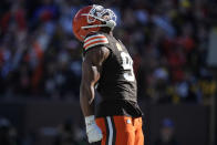 Cleveland Browns defensive end Myles Garrett (95) celebrates his sack on Pittsburgh Steelers quarterback Kenny Pickett during the first half of an NFL football game, Sunday, Nov. 19, 2023, in Cleveland. (AP Photo/Sue Ogrocki)