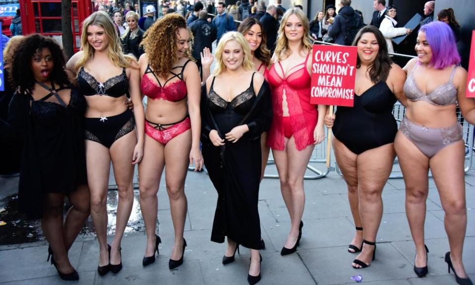 Hayley Hasselhoff (centre) leads models in protest during London fashion week.