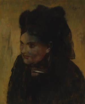 Edgar Degas' "Portrait of a Woman" was painted over top of an earlier, upside-down portrait on the same canvas. By 1922, parts of the original painting were visible as a discoloration across the