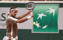 Roger Federer of Switzerland returns a shot in his mens singles first round match against Lorenzo Sonego of Italy during Day one of the 2019 French Open at Roland Garros May 26, 2019 in Paris, France. (Photo by Quality Sport Images/Getty Images)