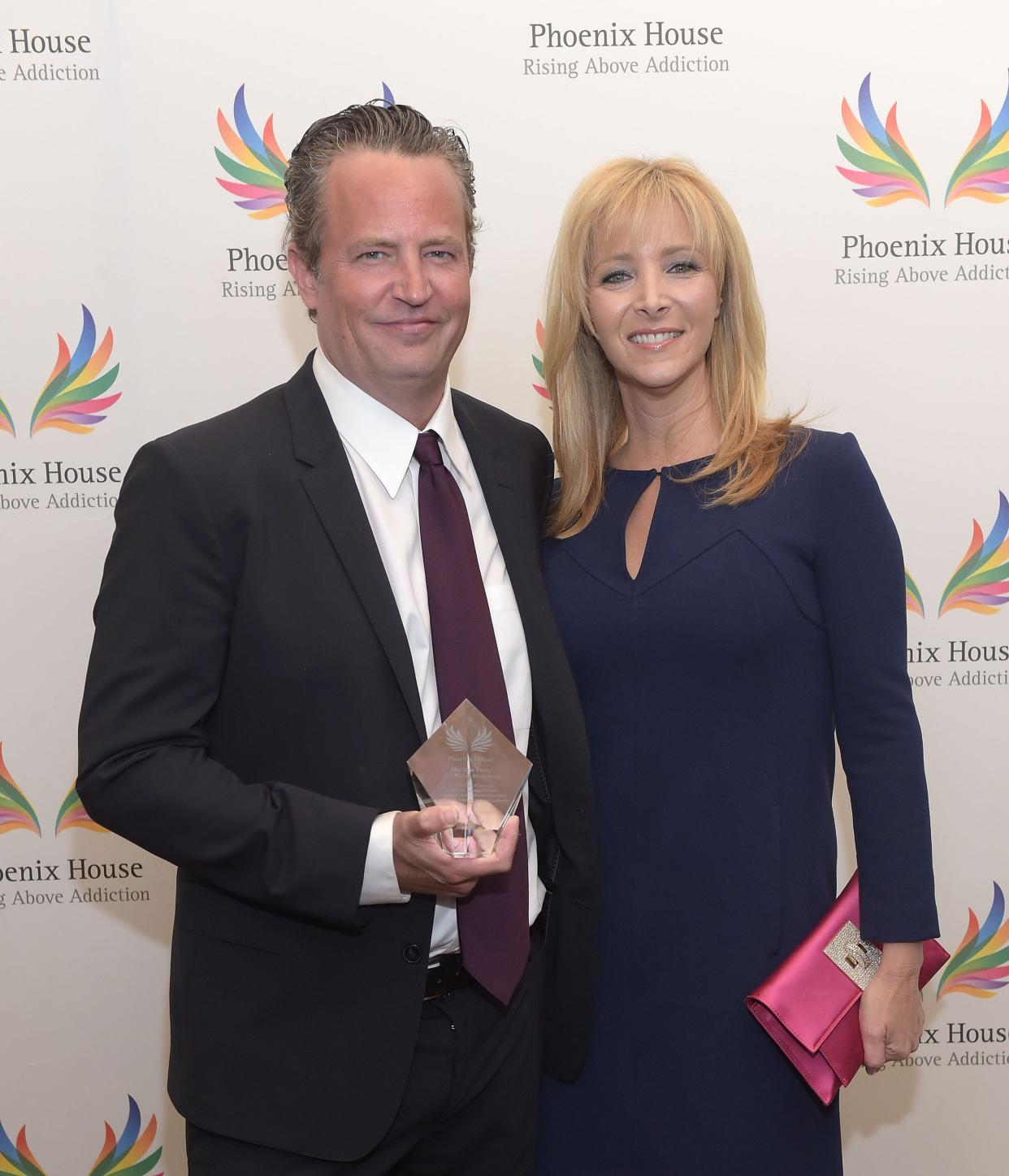 Lisa Kudrow (right), who co-starred with Matthew Perry on the sitcom "Friends," paid tribute to Perry in a touching social media post Wednesday.