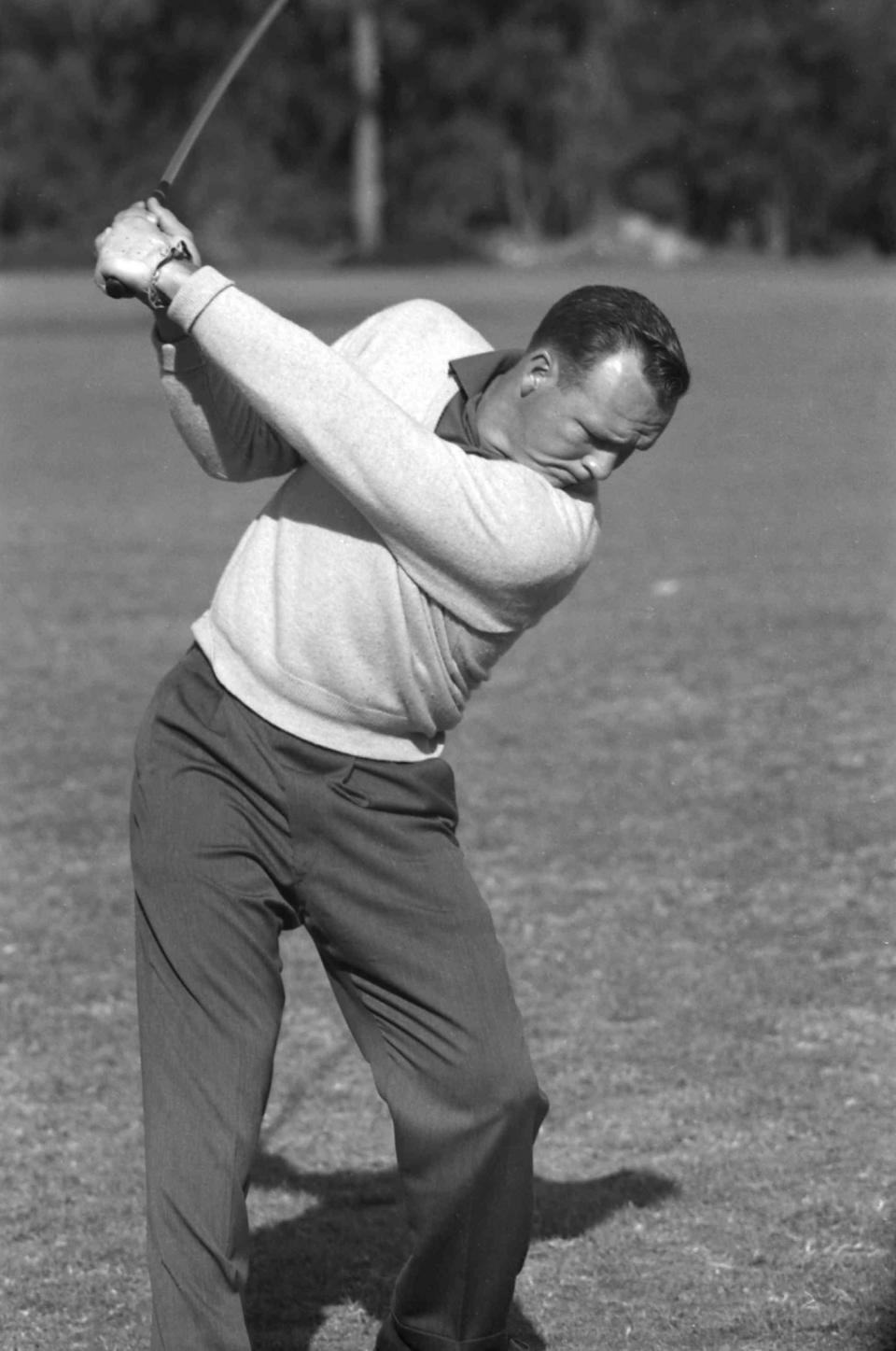 <p>Arnold Palmer during the backswing of a shot. (Photo by Rogers Photo Archive/Getty Images) </p>
