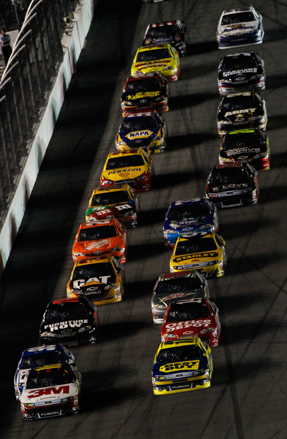 DAYTONA BEACH, FL - FEBRUARY 27: Greg Biffle, driver of the #16 3M Ford, and Matt Kenseth, driver of the #17 Best Buy Ford, lead the field during the NASCAR Sprint Cup Series Daytona 500 at Daytona International Speedway on February 27, 2012 in Daytona Beach, Florida. (Photo by Tom Pennington/Getty Images for NASCAR)