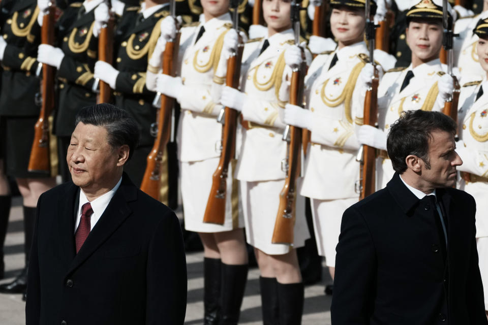 FILE - Chinese President Xi Jinping, left, and France's President Emmanuel Macron review troops during a welcome ceremony at the Great Hall of the People in Beijing, China, April 6, 2023. Russian threats to nuke Ukraine. China’s belligerent military moves around rival Taiwan, its growing ties with Moscow and its growing assertiveness throughout Asia. North Korea’s unprecedented run of weapons testing and development. The top diplomats from seven of the world’s most powerful countries will have plenty to discuss when they gather in the hot spring resort town of Karuizawa starting Sunday, April 16, 2023, for the Group of Seven foreign ministers’ summit. (AP Photo/Thibault Camus)