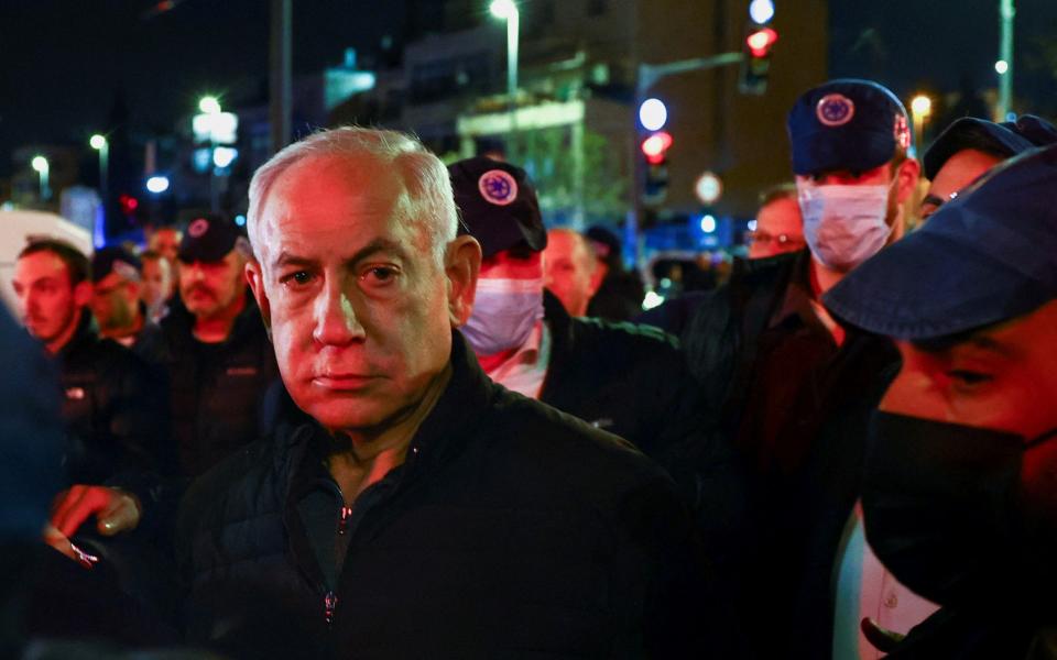 Israeli Prime Minister Benjamin Netanyahu visited the scene of the attack on Friday - RONEN ZVULUN