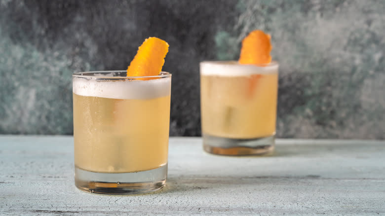 two whiskey sour cocktails
