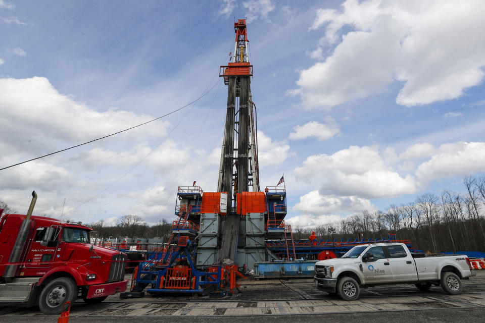 FILE - In this file photo from March 12, 2020, work continues at a shale gas well drilling site in St. Mary's, Pa. (AP Photo/Keith Srakocic, File)