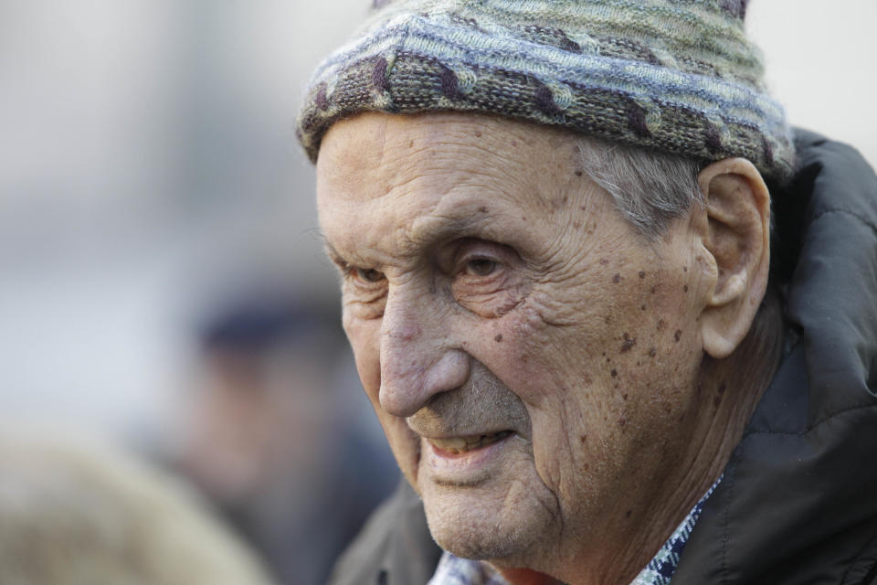 In this photo taken on Dec. 27, 2011, Italian fashion designer Ottavio Missoni attends the funerals of the Italian writer Giorgio Bocca, in Milan, Italy. Italian fashion company Missoni says its co-founder, Ottavio Missoni, has died in his home earlier on Thursday, May 9, 2013 in northern Italy. Missoni, who was 92, founded the iconic fashion brand of zigzagged-patterned knitwear along with his wife, Rosita, in 1953. The Missonis are a family fashion dynasty, with the couple’s children and their offspring involved in expanding the brand. (AP Photo/Luca Bruno)