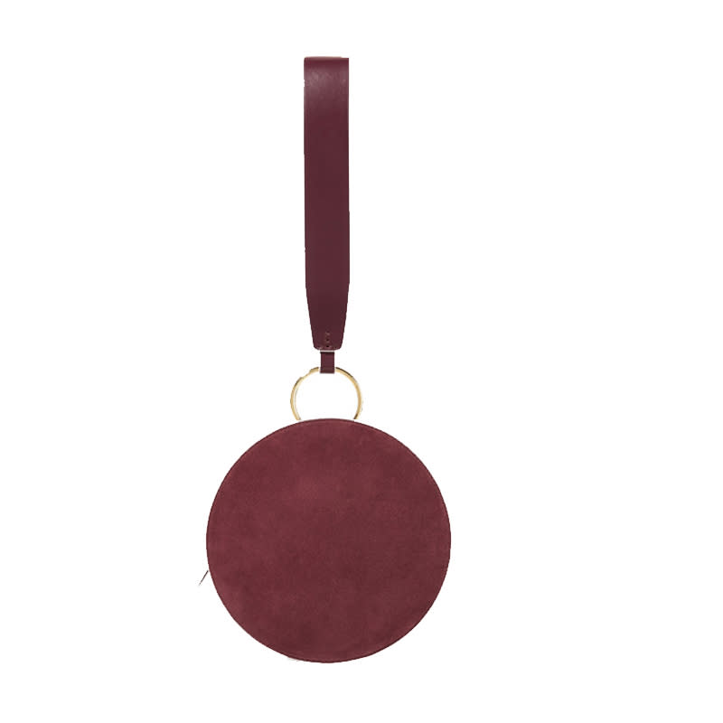 <a rel="nofollow noopener" href="http://rstyle.me/n/crgijzchdw" target="_blank" data-ylk="slk:Circle Two-Tone Leather And Suede Clutch, Diane von Furstenberg, $200;elm:context_link;itc:0;sec:content-canvas" class="link ">Circle Two-Tone Leather And Suede Clutch, Diane von Furstenberg, $200</a>