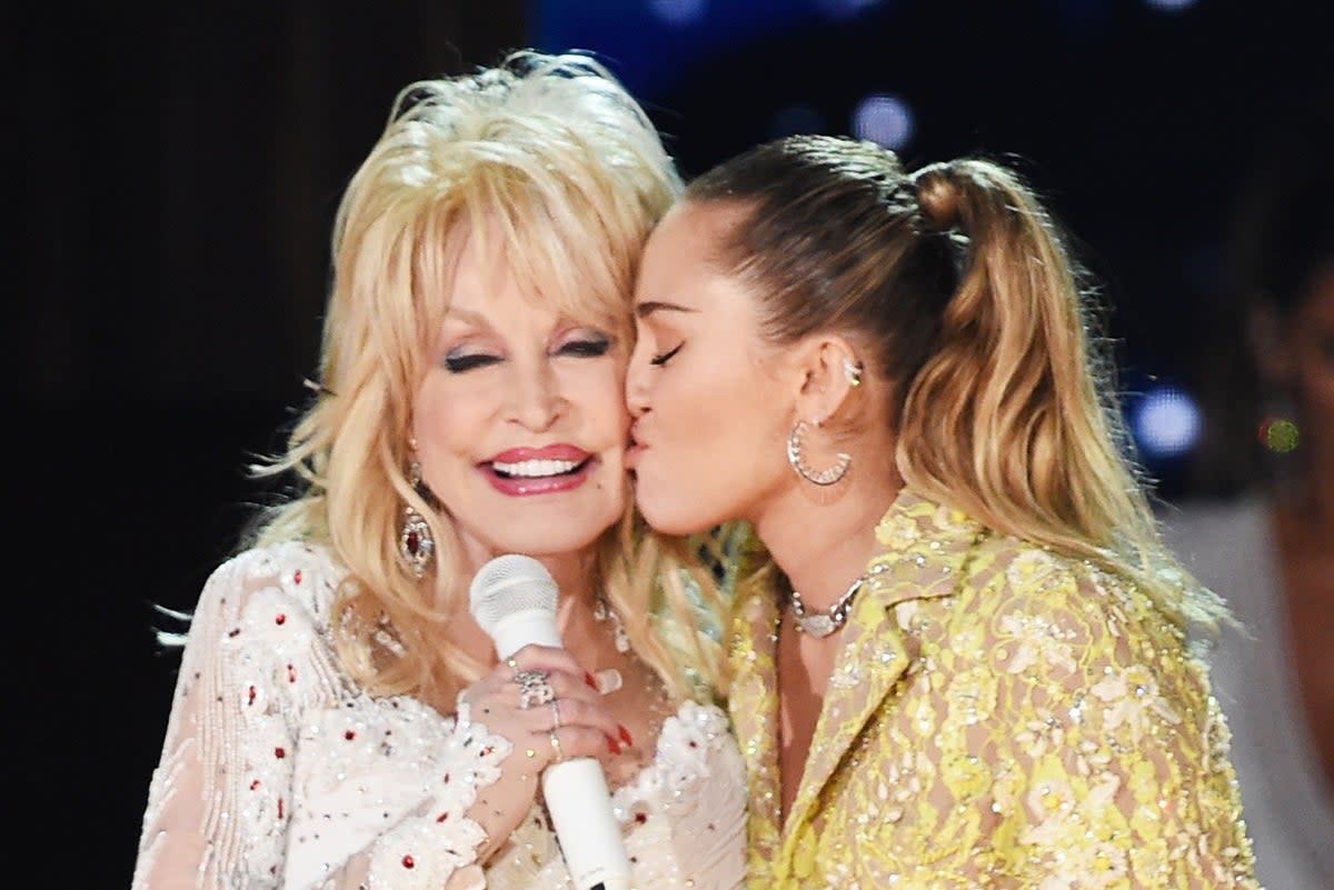 Dolly Parton was full of praise for her goddaughter Miley Cyrus  (Getty)