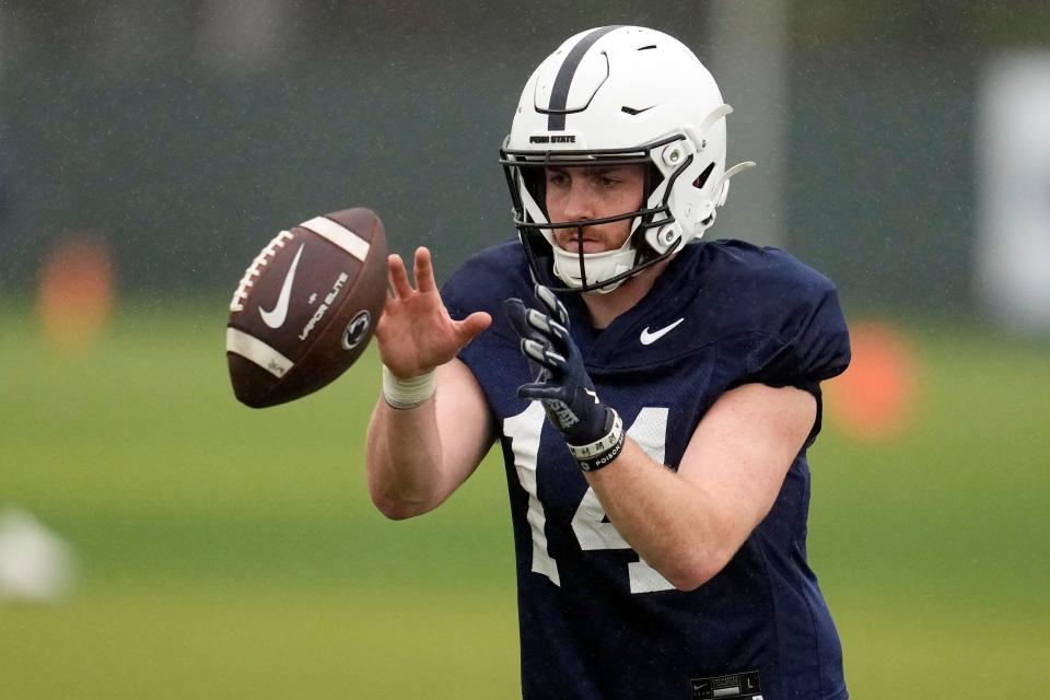 Penn State quarterback Sean Clifford takes a snap during practice ahead of the Rose Bowl NCAA college football game against Utah, Friday, Dec. 30, 2022, in Carson, Calif. (AP Photo/Marcio Jose Sanchez)