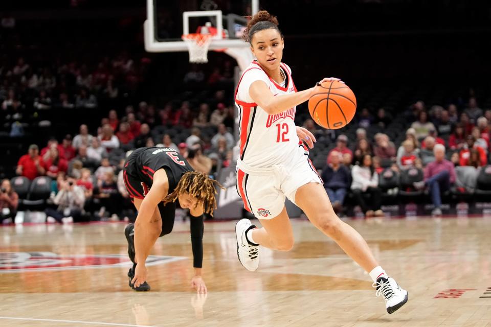 Ohio State guard Celeste Taylor steals the ball from Rutgers guard Mya Petticord on Thursday.