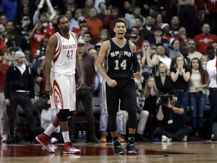 Nene does not find Danny Green's celebration Hilario. (AP)