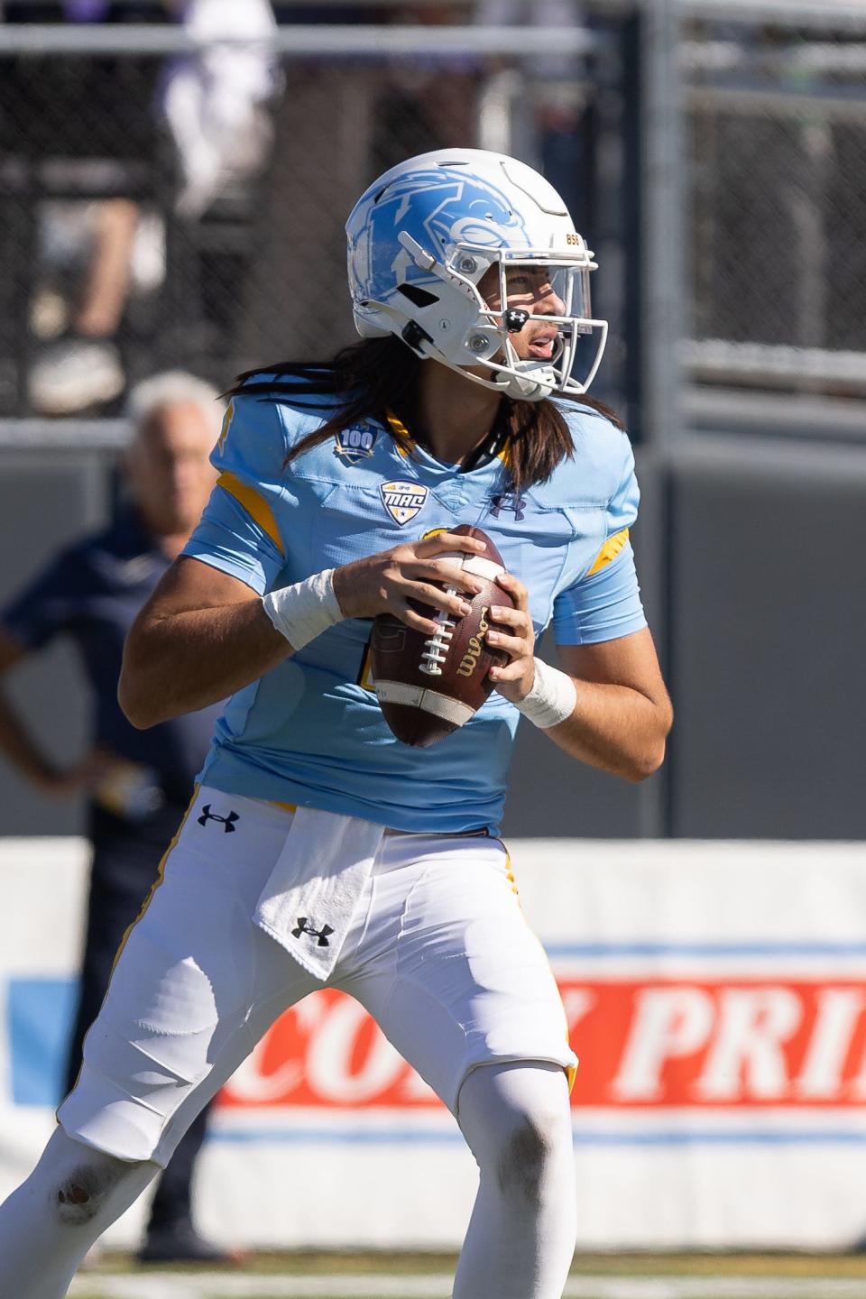 Kent State quarterback Devin Kargman looks for an open receiver during Saturday’s game against the Akron Zips at Kent State University’s Dix Stadium.