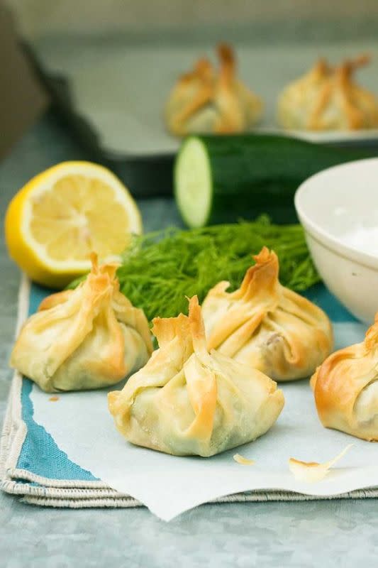 <p>Scrummy Lane</p><p>Your Friendsgiving crew is going to love these cute little Greek filo parcels stuffed with lovely Mediterranean flavors including spinach, feta cheese, dill and sun dried tomatoes.</p><p><strong>Get the recipe:</strong><a href="https://scrummylane.com/greek-filo-parcels-with-tzatziki/" rel="nofollow noopener" target="_blank" data-ylk="slk:Greek Filo Parcels with Tzatziki;elm:context_link;itc:0;sec:content-canvas" class="link rapid-noclick-resp"><strong> Greek Filo Parcels with Tzatziki</strong></a></p>