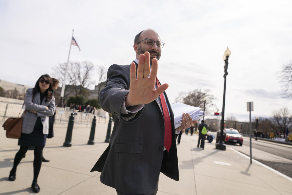 Attorney Ari Holtzblatt, with Wilmer Hale, the law firm representing Twitter, walks out of the Supreme Court building, Wednesday, Feb. 22, 2023, in Washington, after the Supreme Court heard oral arguments. The Supreme Court is weighing Wednesday whether Facebook, Twitter and YouTube can be sued over a 2017 Islamic State group attack on a Turkish nightclub based on the argument the platforms assisted in fueling the growth of the terrorist organization. (AP Photo/Andrew Harnik)