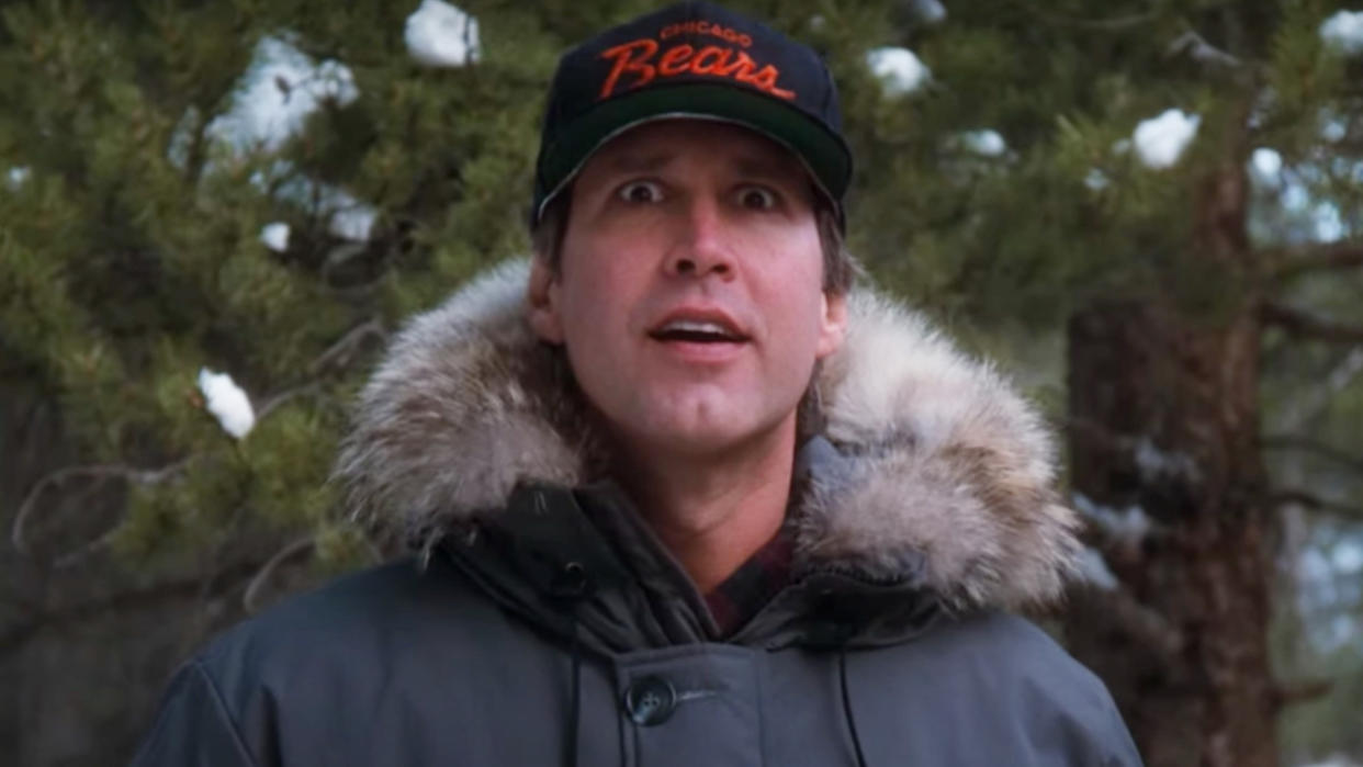  Chevy Chase looking a tree in National Lampoon's Christmas Vacation. 