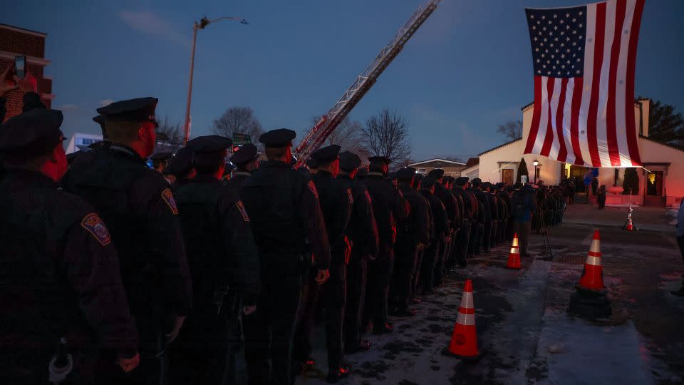 Hundreds of police officers line up to attend a wake for Boston Police officer John O'Keefe at St. Francis of Assisi Church on February 6, 2022, in Braintree, Massachusetts. - Matthew J. Lee/The Boston Globe/Getty Images