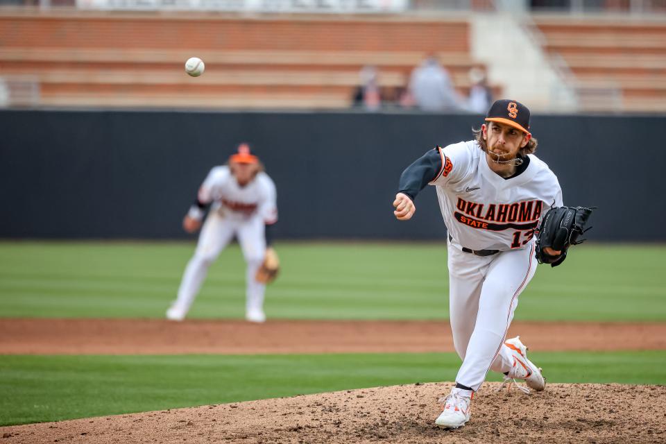 Oklahoma State utility Nolan McLean (13) pitches during a college baseball game between the Oklahoma State Cowboys (OSU) and the Loyola Marymount University Lions (LMU) at O’Brate Stadium in Stillwater, Okla., on Saturday, Feb. 25, 2023.