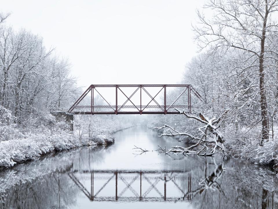 Old Train Bridge over a Canal in Winter (Illinois).
