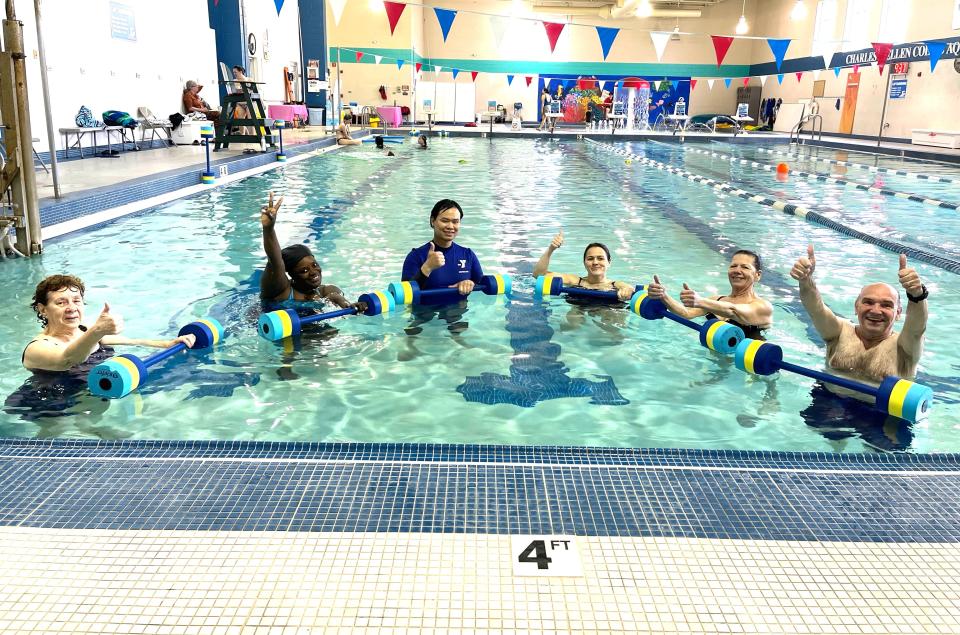 Old Colony YMCA instructor Richard Lao, center, teaches adults how to float during a free adult swim class on Wednesday, April 19, 2023 in Taunton. (Courtesy Photo/ Rob Labbe)