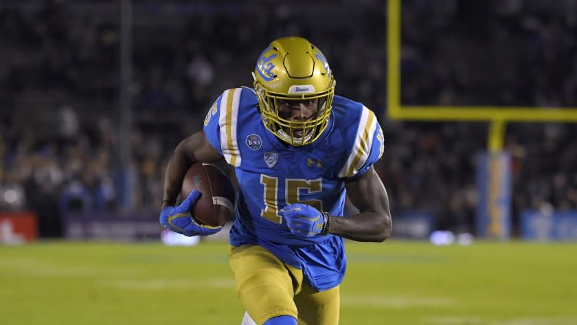 UCLA wide receiver Jaylen Erwin runs in for a touchdown during the first half of an NCAA college football game against California Saturday, Nov. 30, 2019, in Pasadena, Calif. (AP Photo/Mark J. Terrill)