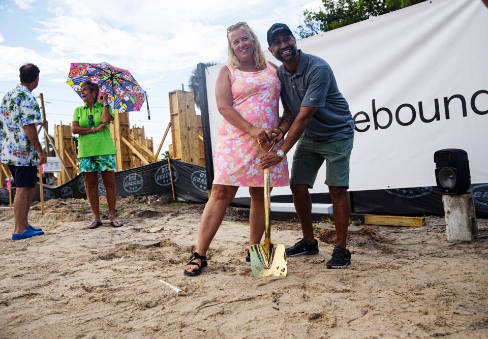 Debi Szekely attends a groundbreaking ceremony with Fort Myers Beach elected officials and builders for Homebound including Samir Malviya, vice president of Homebound for her new Fort Myers Beach home on Friday, Sept. 8, 2023. The home was destroyed in Hurricane Ian last year. Homebound is building a new home on the property.