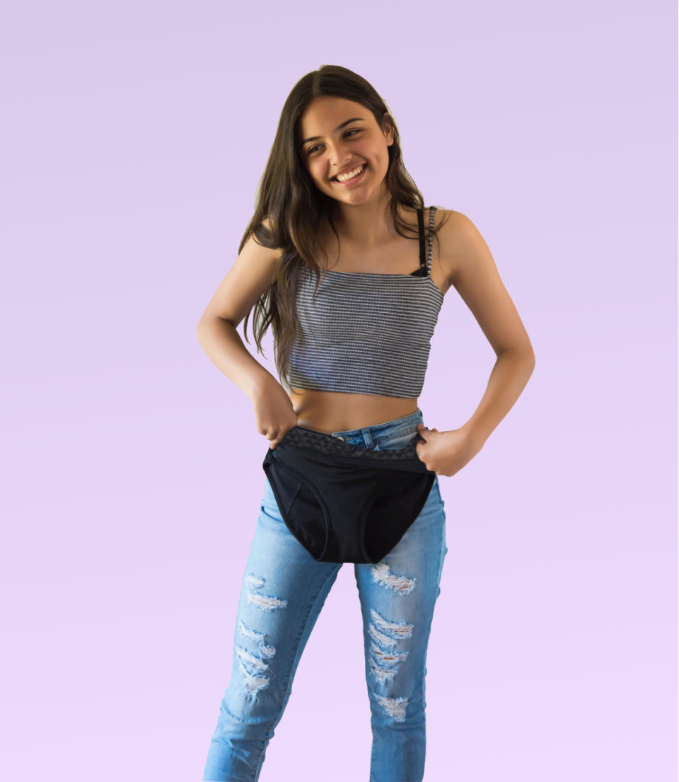 Girl holding AWWA period undies