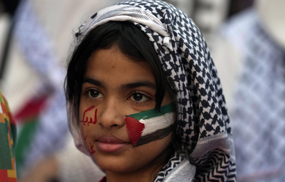 A supporter of Jamaat-e-Islami attends a protest against Israeli airstrikes and to show solidarity with Palestinian people living in Gaza, in Karachi, Pakistan, Sunday, Jan. 14, 2024. (AP Photo/Fareed Khan)