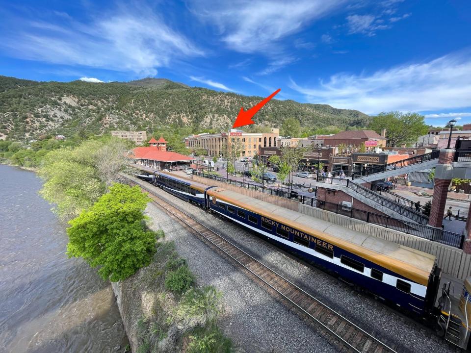 An arrow points to The Hotel Denver in Glenwood Springs, Colorado.