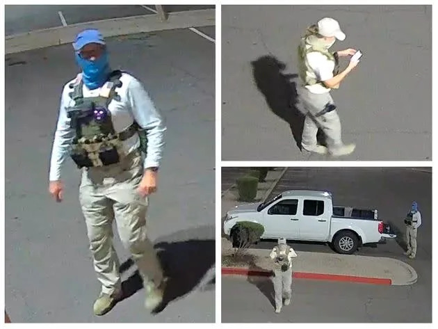 Two armed individuals dressed in tactical gear surveilled a ballot drop box in Mesa, Arizona, on Friday. (Photo: Maricopa County Elections Department)