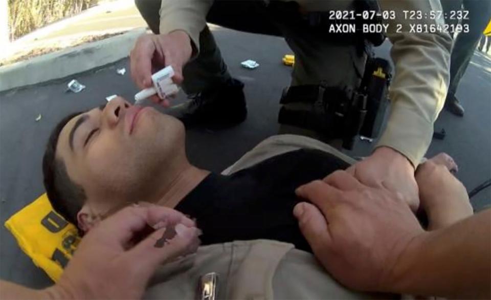 An image from a 2021 video allegedly shows a San Diego sheriff’s deputy collapsing after being exposed to fentanyl (San Diego County Sheriff’s Office)